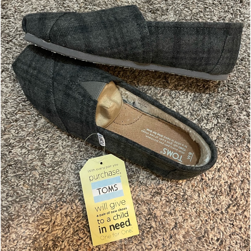 Brand new flannel TOMS lined with fur.